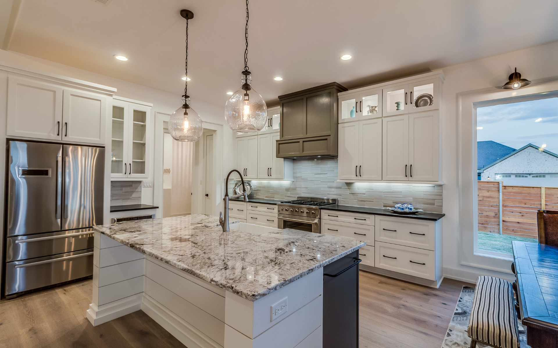 Elegant L type kitchen with granite countertops