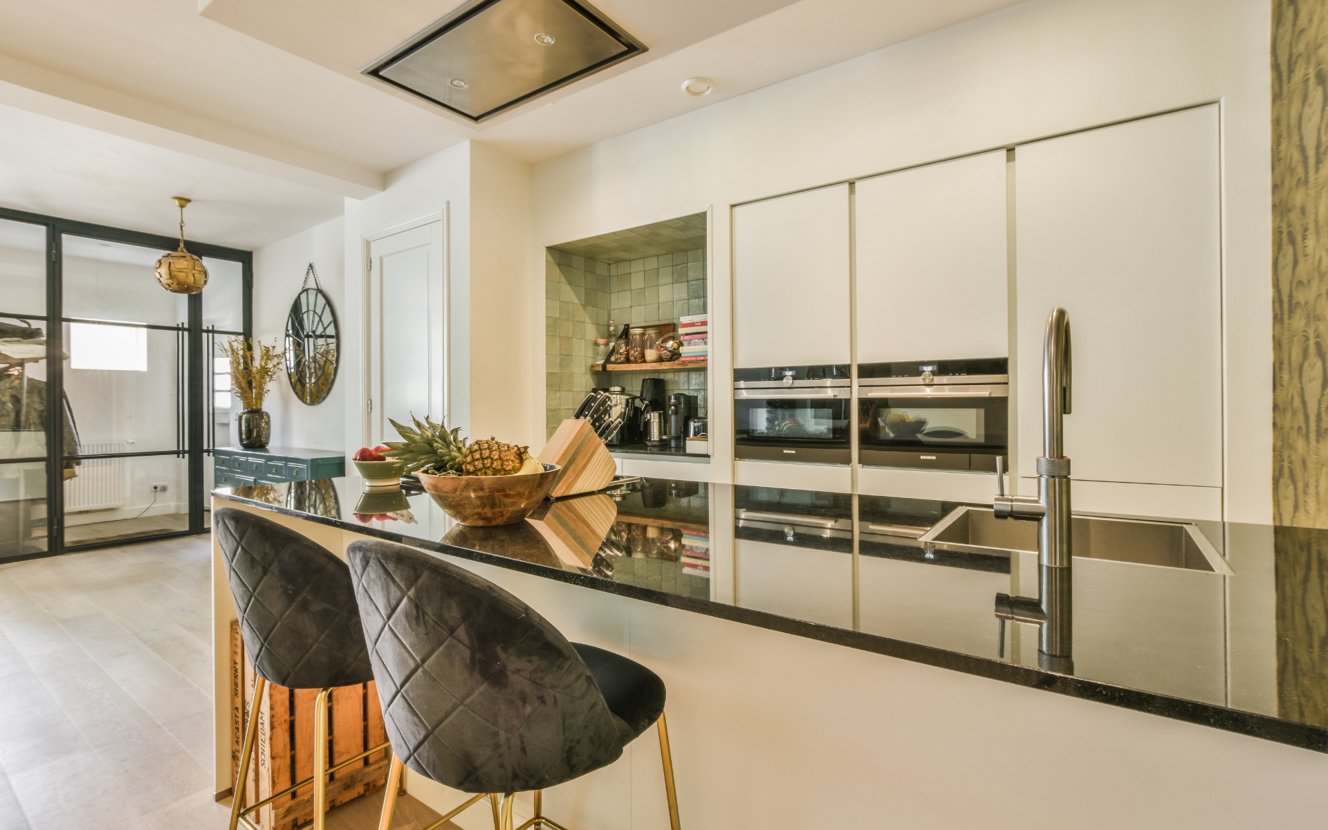 Simple, yet elegant kitchen with white cabinets