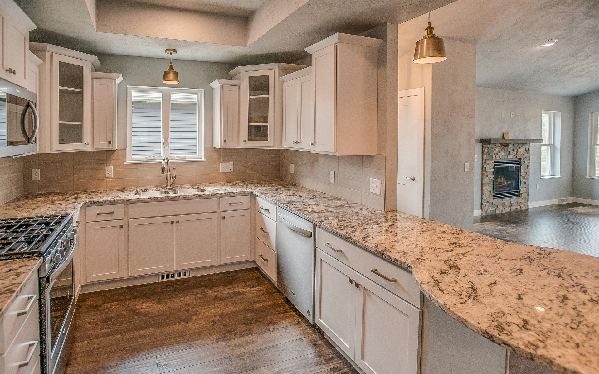 U type kitchen with white cabinets