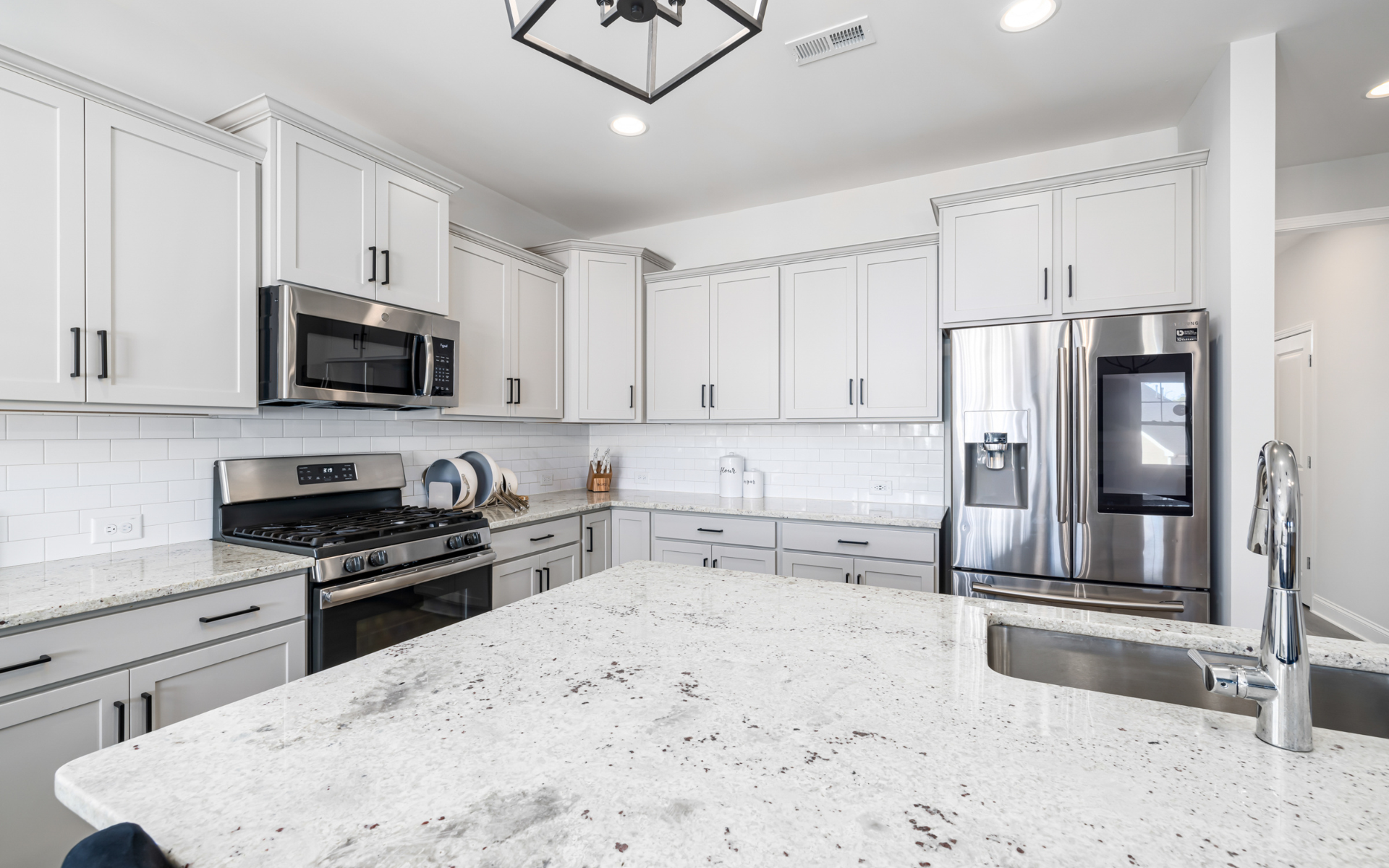 Clean, sleek kitchen with white countertop