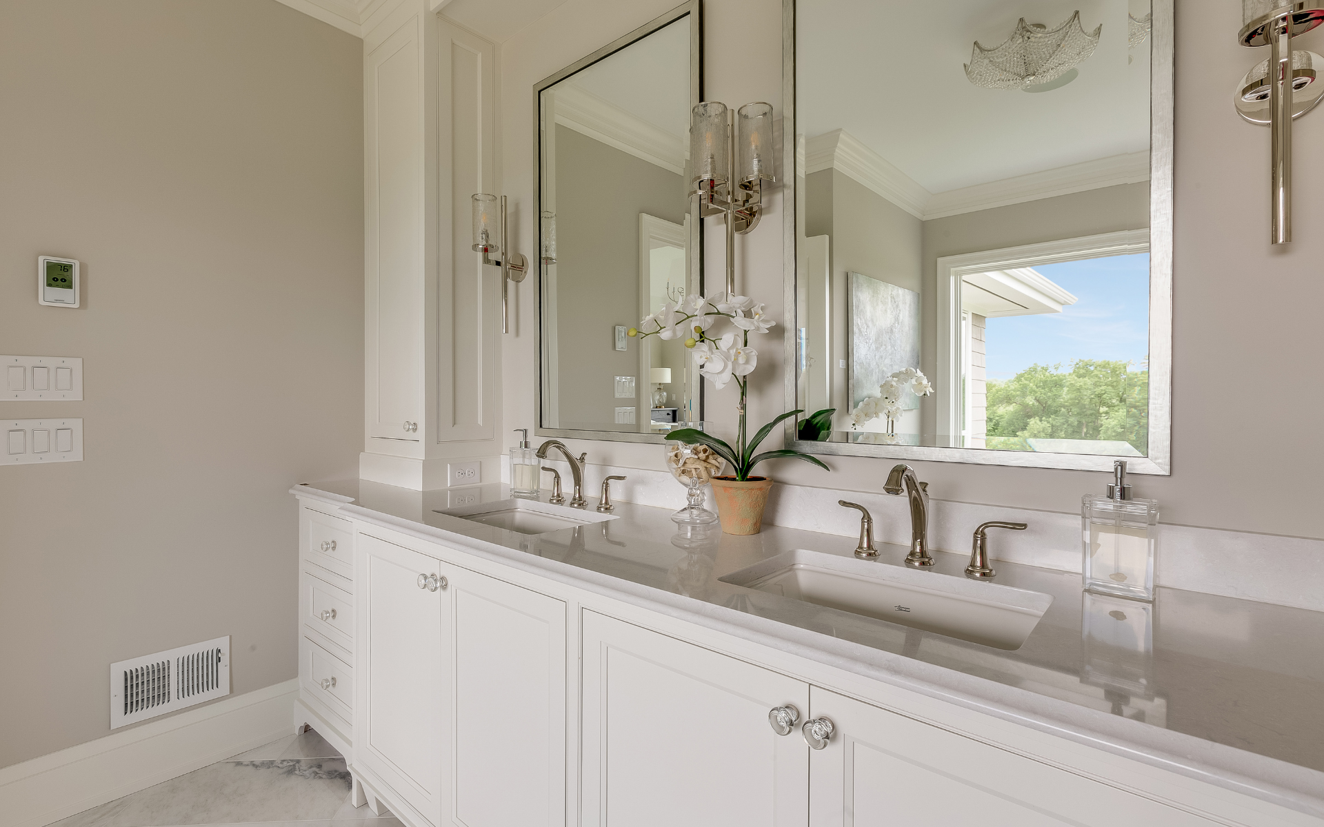 Double-sink vanity with marble countertops